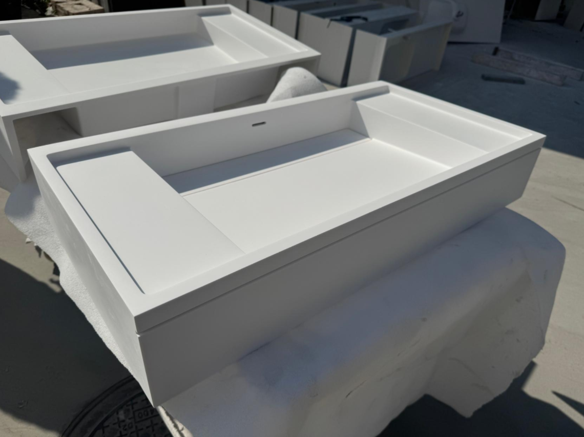 White solid surface integrated basin